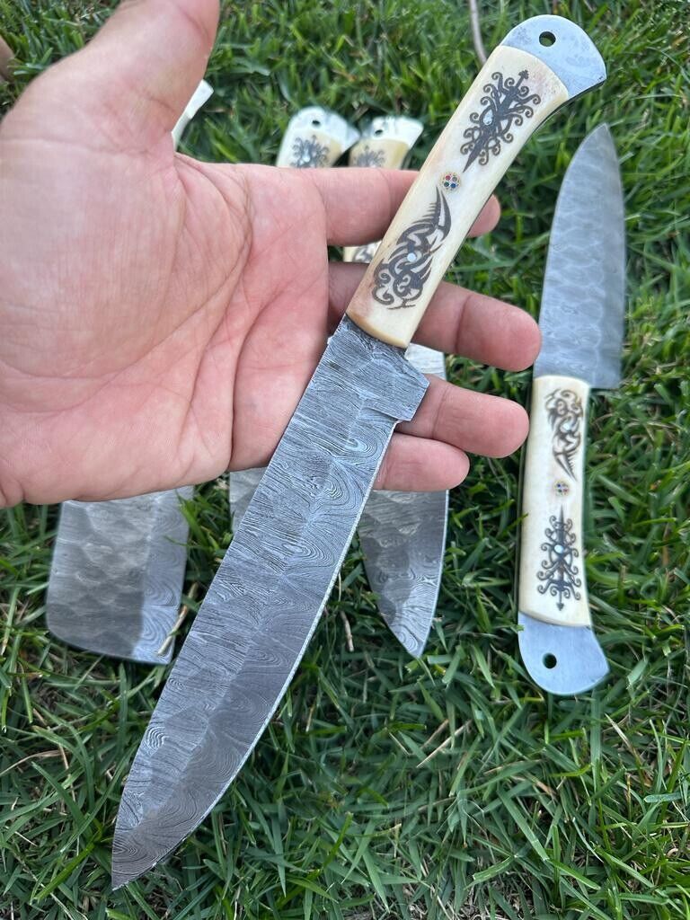 Elegant kitchen set of custom handmade Damascus knives with 9 to 13-inch blades and intricately engraved camel bone grips