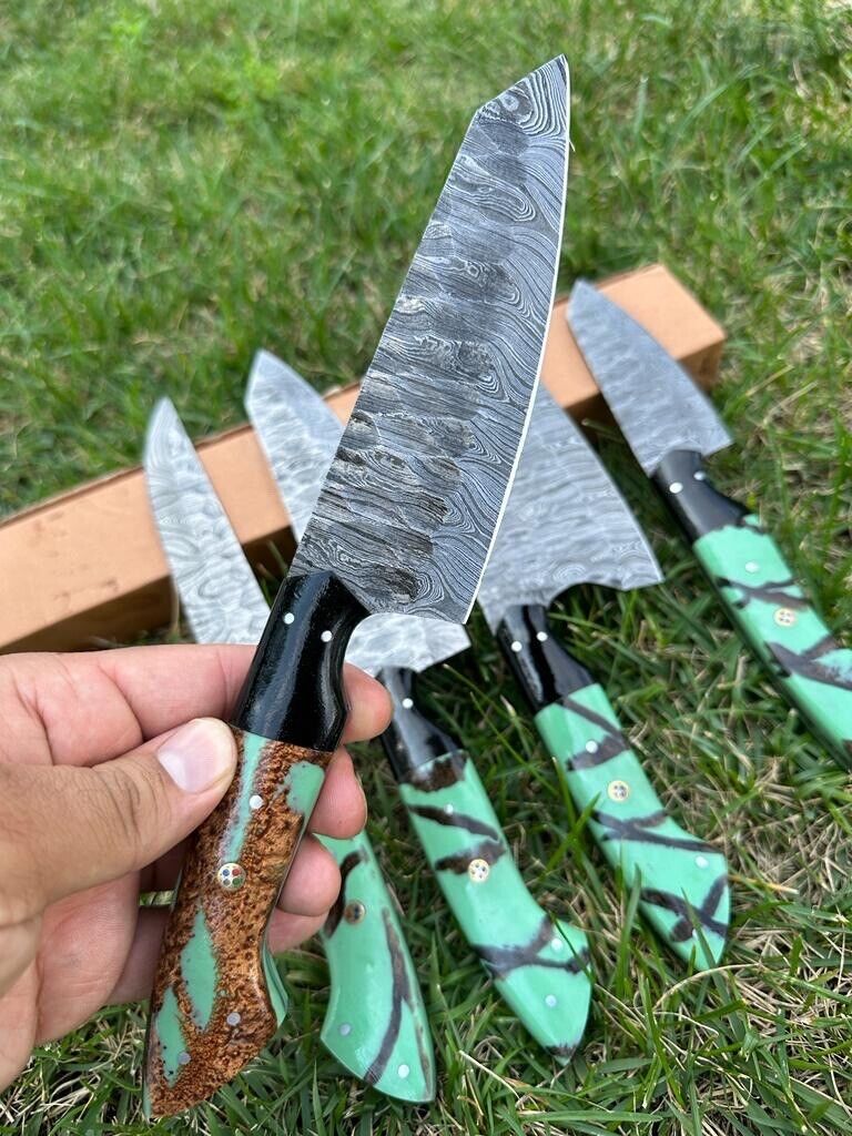 "Exquisite Damascus steel kitchen knives displayed on a wooden cutting board, showcasing unique patterns and sharp blades