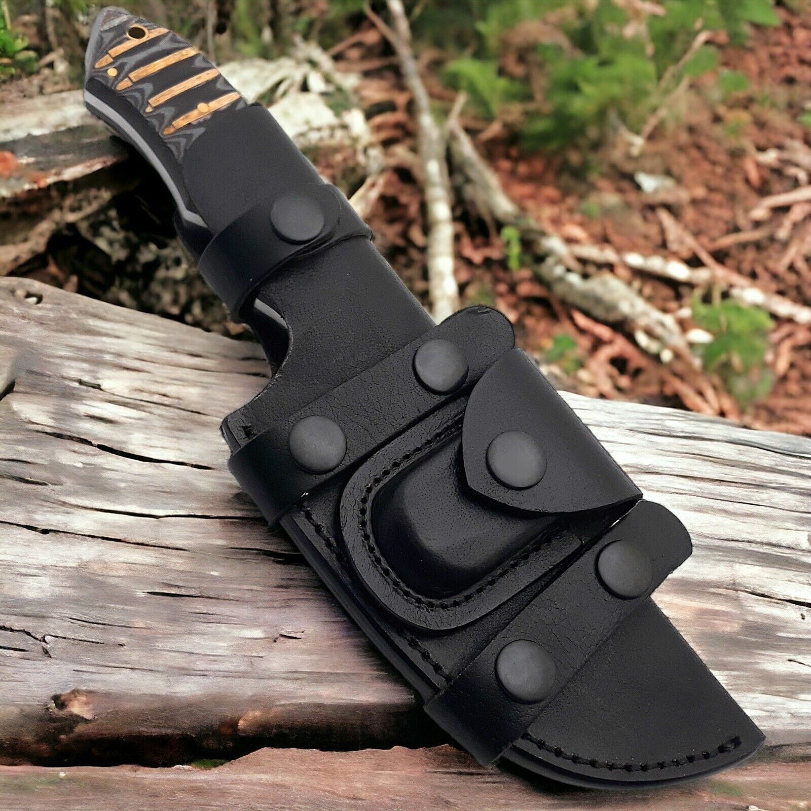 Handcrafted Damascus steel Tom Brown tracker knife with rugged full tang design.