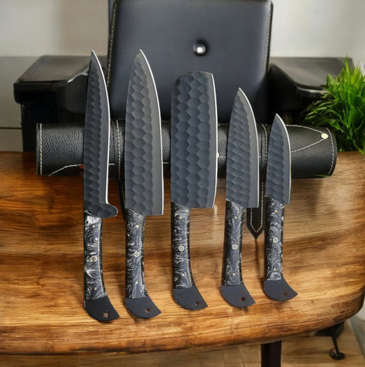 "Handcrafted custom kitchen knife set with forged stainless steel blades and resin handles in leather case"

