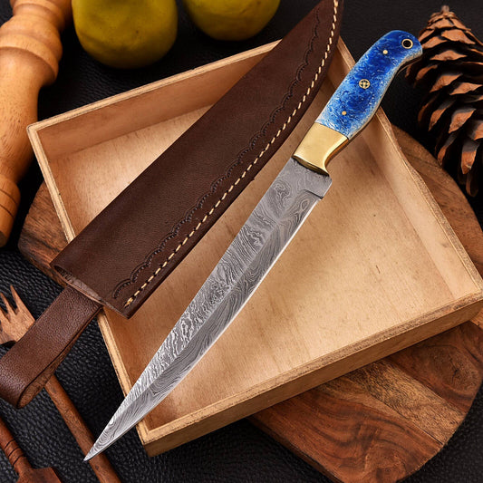 Handmade Damascus fillet knife with brass bolster and resin handle, accompanied by a leather sheath for protection