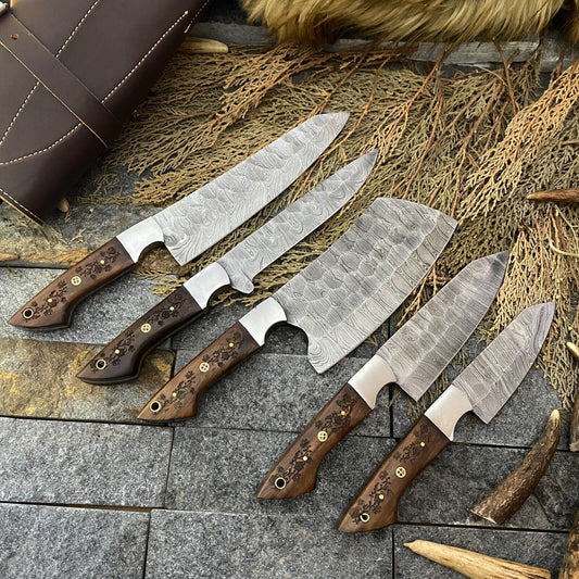 "Handmade Damascus knife set with 9” to 13” blades and rosewood handles featuring steel bolsters