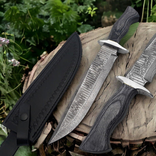 Handmade Damascus steel Bowie knife with a 15-inch blade, Pakka wood handle, and steel guard, displayed with leather sheath