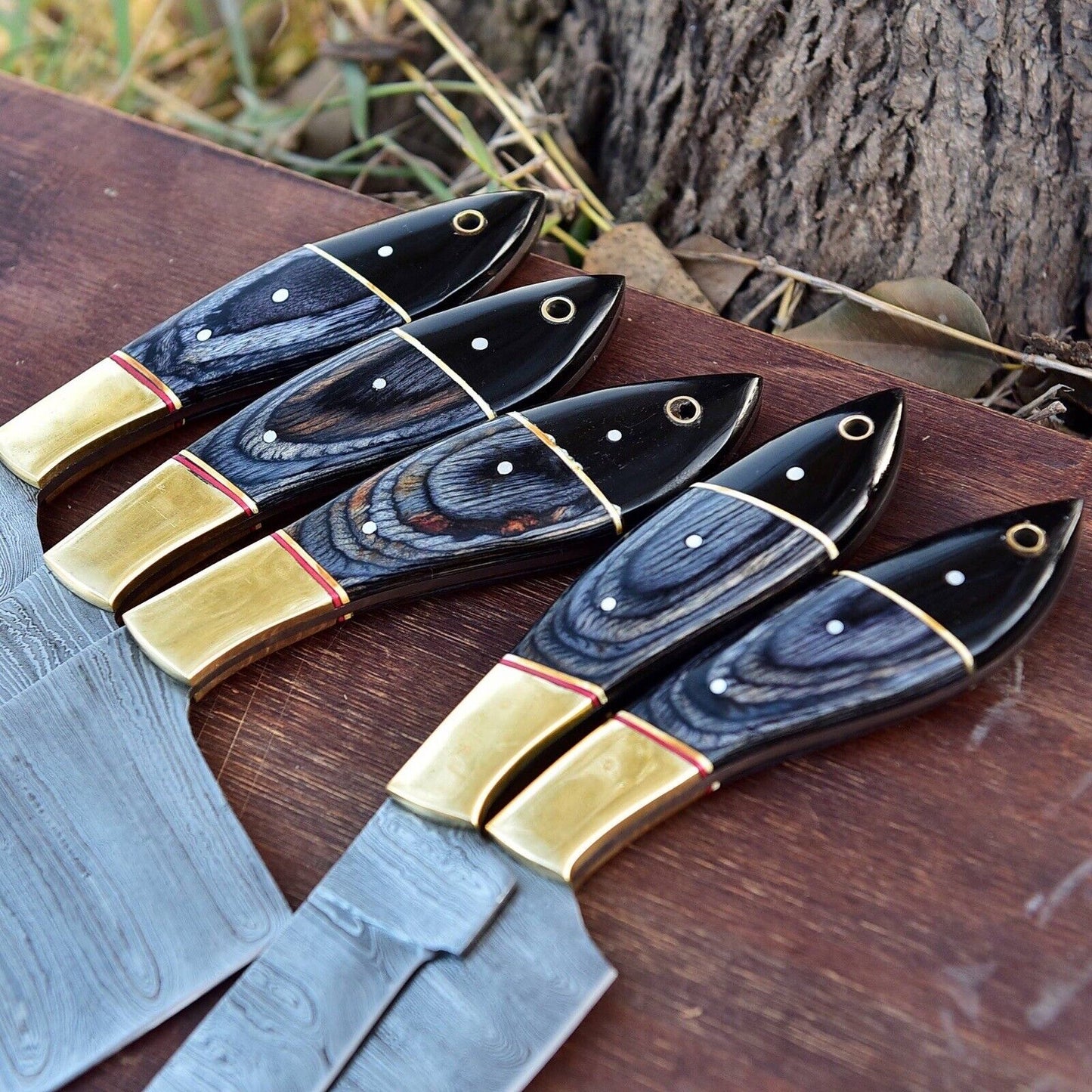 High-quality Damascus steel knife set featuring pakkawood and brass bolster handles