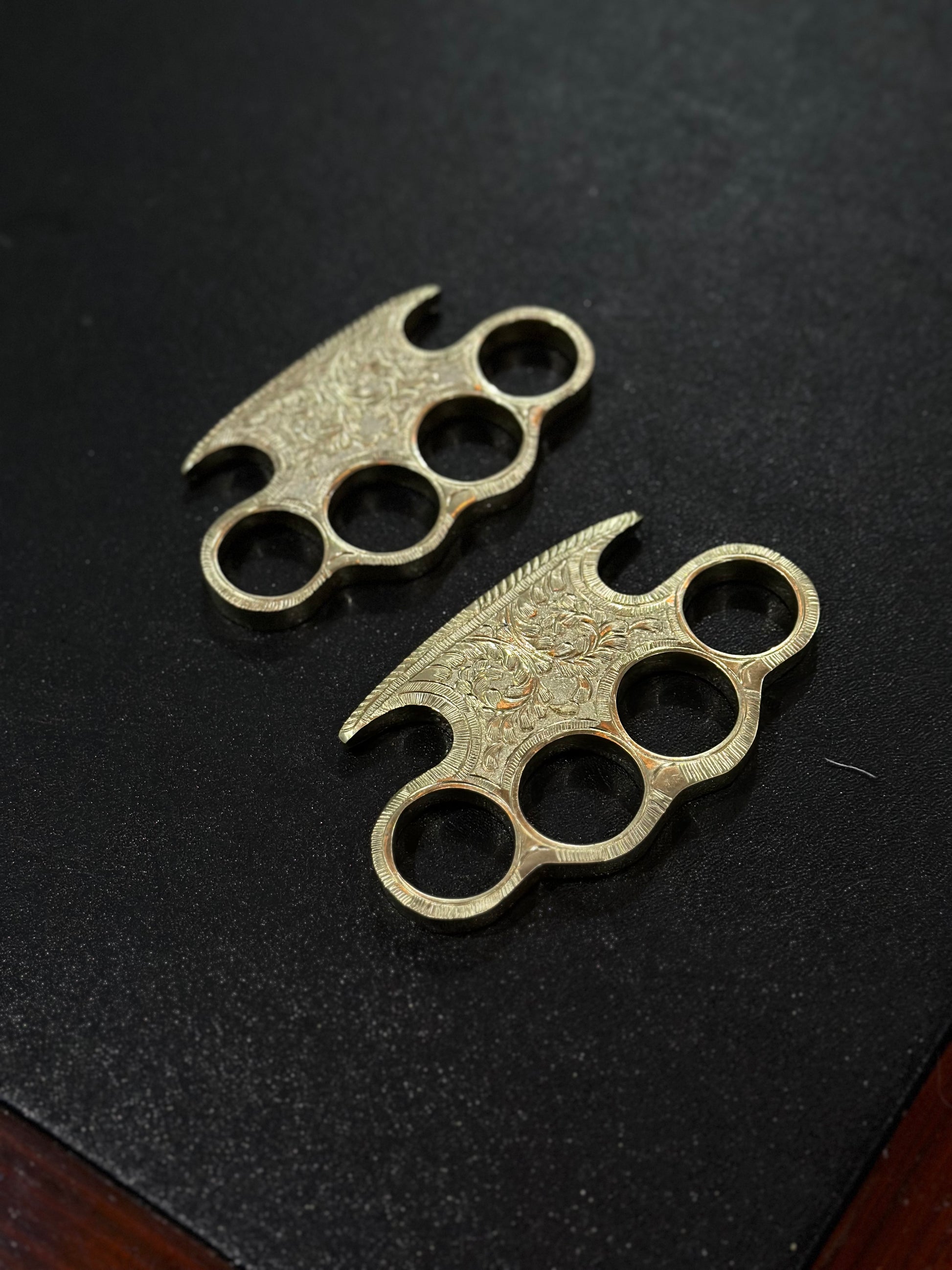 Personalized brass knuckle with custom engraving and high-quality leather case