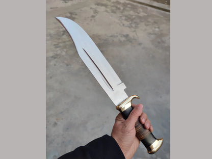 aul Hogan's Crocodile Dundee Bowie Knife with 16-inch 440C steel blade, leather and buffalo horn handle, brass guard, and a high-quality leather sheath