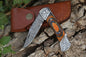 Custom handmade Damascus steel folding knife