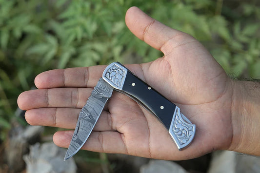 Custom handmade Damascus steel folding knife