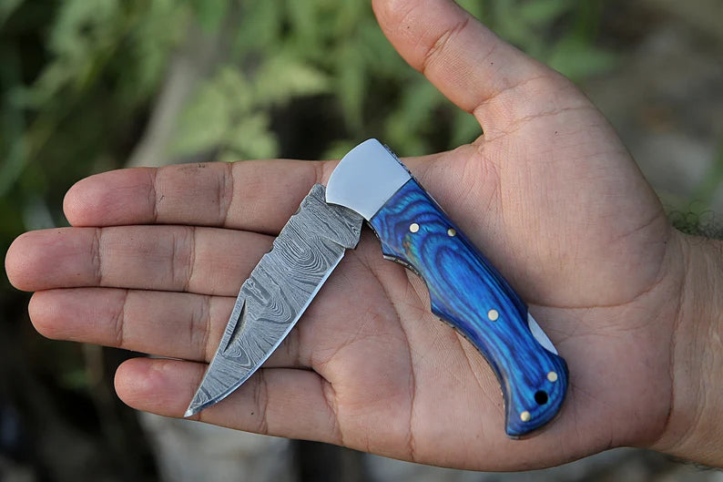 Custom handmade Damascus steel folding knife