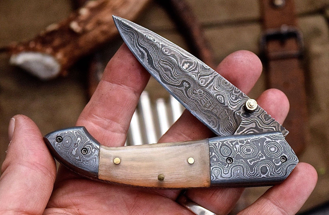 Damascus steel folding knife