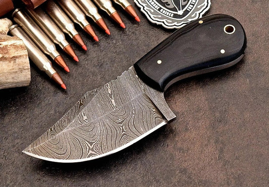 Custom handmade Damascus steel skinning knife