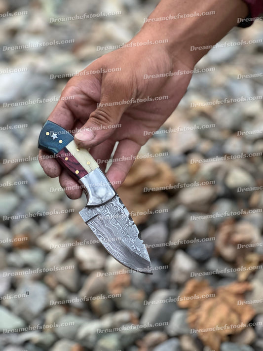 Custom handmade Damascus steel skinning knife