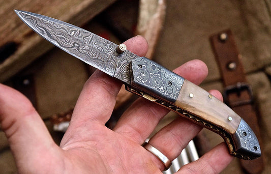 Damascus steel folding knife