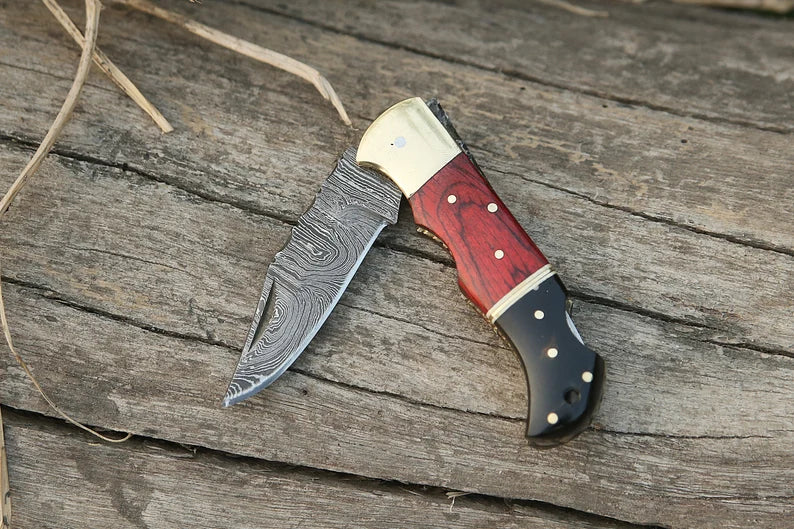 Custom handmade Damascus steel folding knife