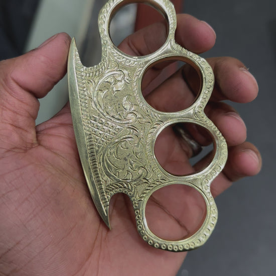 Person Wearing Custom Engraved Brass Knuckles