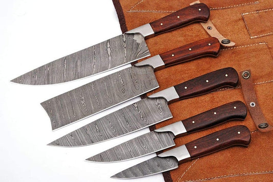 Handcrafted Damascus kitchen knife set with natural rosewood handles, featuring unique twisted pattern blades